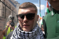 Member of Irish band Kneecap in court for waving Hezbollah flag at concert