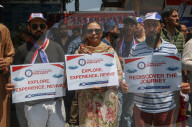 Boat Rally At Dal Lake Organized To Revive Tourism In Kashmir