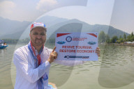 Boat Rally At Dal Lake Organized To Revive Tourism In Kashmir