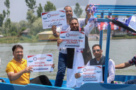 Boat Rally At Dal Lake Organized To Revive Tourism In Kashmir