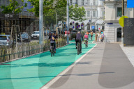 Cyclists On Urban Bike Lanes In Vienna