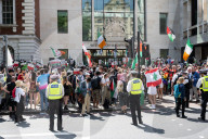Kneecap’s Liam Óg Ó hAnnaidh freed on bail as hundreds of supporters gather at Westminster Magistrates Court, London, UK.