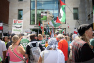 Kneecap’s Liam Óg Ó hAnnaidh freed on bail as hundreds of supporters gather at Westminster Magistrates Court, London, UK.