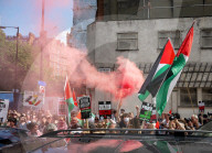 Kneecap’s Liam Óg Ó hAnnaidh freed on bail as hundreds of supporters gather at Westminster Magistrates Court, London, UK.