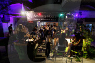Tel Aviv youth enjoy a quiet moment between missile alerts
