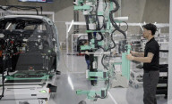 First US purpose built robot taxi factory opens