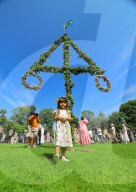 Traditional Midsummer Celebrations In Sweden