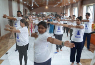 Health Workers Performing Yoga Inside A Hospital In Kolkata, India