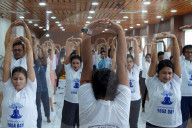 Health Workers Performing Yoga Inside A Hospital In Kolkata, India