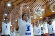 Health Workers Performing Yoga Inside A Hospital In Kolkata, India