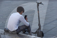 Young Man With E-Scooter