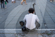Young Man With E-Scooter