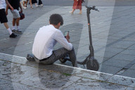 Young Man With E-Scooter
