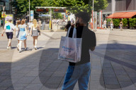 Young Man With Primark Tote Bag