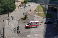 German Red Cross Ambulance In City Traffic In Stuttgart