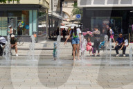 Families Cool Off In City Fountain