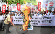 SUCI Activists Burning Effigy Of Donald Trump  And Benjamin Netanyahu In Kolkata, India Over Iran -Israel War. War 
