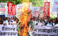  SUCI Activists Burning Effigy Of Donald Trump  And Benjamin Netanyahu In Kolkata, India Over Iran -Israel War. War 
