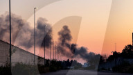 Smoke Plumes Rise From Plastic Depot Fire