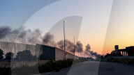 Smoke Plumes Rise From Plastic Depot Fire
