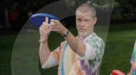Brad Pitt revs up for F1 movie premiere with frisbee