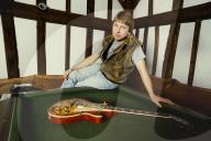 Photo of Mick Ralphs at home in 1984,