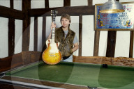 Photo of Mick Ralphs at home in 1984,