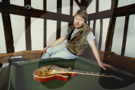 Photo of Mick Ralphs at home in 1984,
