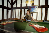 Photo of Mick Ralphs at home in 1984,