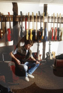 Photo of Mick Ralphs at home in 1984,