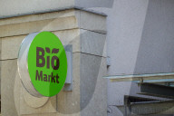 Denns Bio Market Sign On Building Exterior