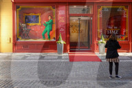 Tourists At Madame Tussauds Entrance In Prague