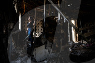 Freed Israeli hostage revisits her charred home