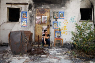 Freed Israeli hostage revisits her charred home