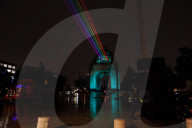 Rainbow-Colored Lasers, Projected To The Sky For Pride Celebrations