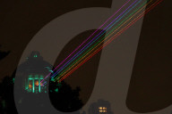Rainbow-Colored Lasers, Projected To The Sky For Pride Celebrations