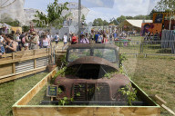 'Telly-shrubbies', morris dancers and living graffiti: Glastonbury's Shangri-La gets a revamp.