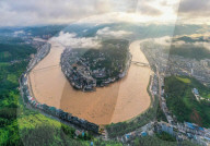 Floodwaters Flowing Through Congjiang