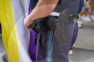 German Police Officer With Holstered Pistol