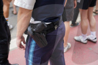 German Police Officer With Holstered Pistol