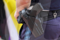 German Police Officer With Holstered Pistol