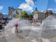 People Cooling Off In Fountain At Munich Karlsplatz Stachus During Heatwave