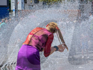 People Cooling Off In Fountain At Munich Karlsplatz Stachus During Heatwave
