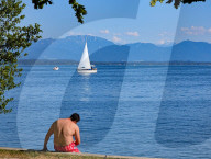 Swimmers And Sunbathers At Bavarian Lake Starnberg