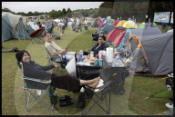 Tennis fans queue for Wimbledon tickets in London, UK.