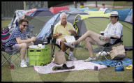 Tennis fans queue for Wimbledon tickets in London, UK.