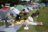 Tennis fans queue for Wimbledon tickets in London, UK.