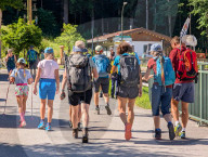 Hikers Set Off On A Day Trip In The Bavarian Alps