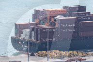 The Container Ship Zim Luanda Leaves The Port Of Barcelona.