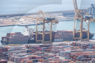 The Container Ship Zim Luanda Leaves The Port Of Barcelona.